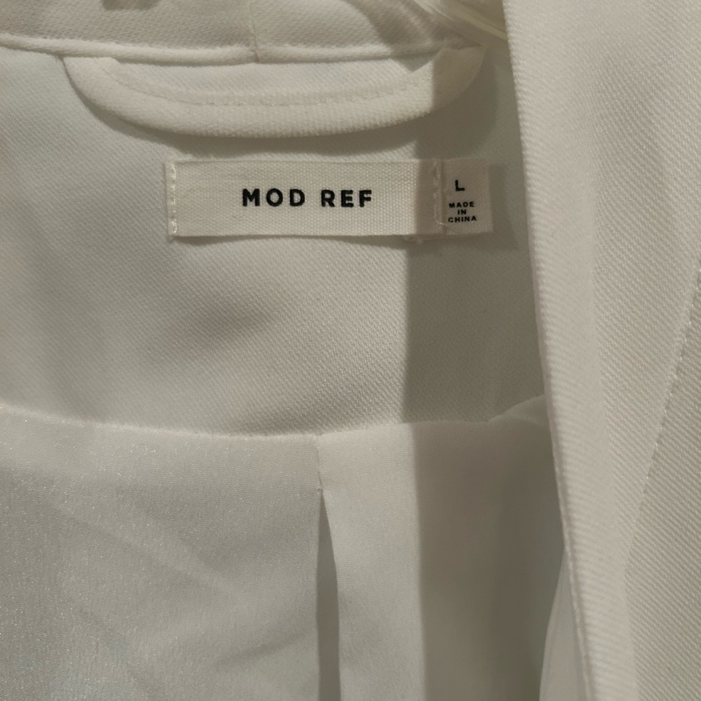 Pocketed blazer tags removed but never worn